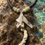 Cristal de roca y coral blanco · en su ambiente